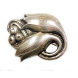 A Georg Jensen Danish silver brooch, of two flower buds and berries, bearing UK hallmark and numbere