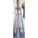 A pair of oars and an artists easel.
