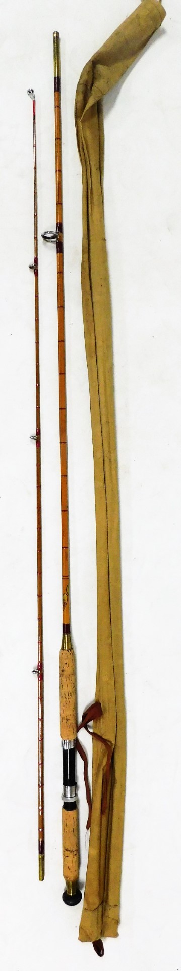 A Jeffery and Son limited vintage split cane two piece spinning rod, with canvas bag.