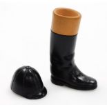 A Tony Boots pottery boot and riding hat, the boot 10cm high the hat 4cm high. (2)