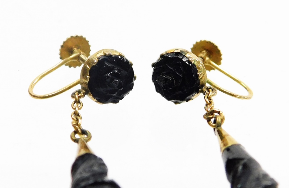 A pair of carved jet drop earrings, the studs with floral rosette, on a three tier carved drop, with - Image 2 of 2