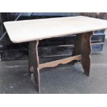 A light oak refectory table, 75cm high, 130cm wide, 78cm deep.