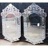 A pair of modern glass wall mirrors, rectangular, inlaid with white spotted floral decoration, made