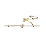 A diamond set bar brooch, the central old cut stone in claw setting, 5.8mm x 5.4mm x 4.2mm, totallin