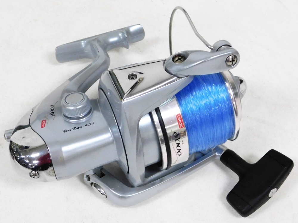 A Shakespeare Tidewater XD80 fixed spool fishing reel, two other fixed spool reels and a Wychwood fi - Image 4 of 4