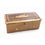 A 19thC walnut cased musical box, the rosewood ground marquetry top depicting the figure of a dog, w
