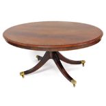 A 20thC mahogany coffee table, with a wide cross banding, raised on quadruple fluted saber legs, ter