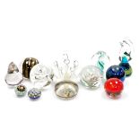 A group of glass paperweights and ornaments, of varying design, to include two miniature millefiori