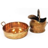 A large old copper two handled pan, and a copper coal bucket, the pan 43cm diameter. (2)