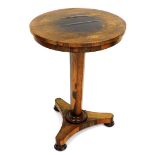 A Victorian rosewood circular occasional table, raised on octagonal stem, terminating on a platform