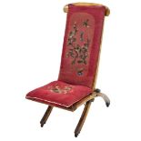 A Victorian beech and woven cane folding campaign style chair, with beadwork cushions 39cm wide. (AF