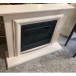 An Avensis Suite Creamstone electric fire in cream surround