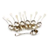 A set of twelve Victorian Old English pattern silver dessert spoons, London 1881, 17.5oz. (12)