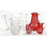 A group of glassware, to include a Mary Gregory style cranberry glass milk jug, with flared feet, tw