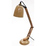 A Terrance Conran habitat desk lamp, possibly 20thC, adjustable, with a beige shade, on plastic arm