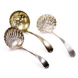 A George V Old English pattern silver sugar sifter spoon, with pierced bowl, Birmingham 1928, and t