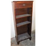 An Edwardian mahogany narrow bookcase, with single drawer, 117cm high, 47cm wide.