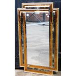 A modern art glass wall mirror, with a gilt applied surround, with two colour glass banded surround,