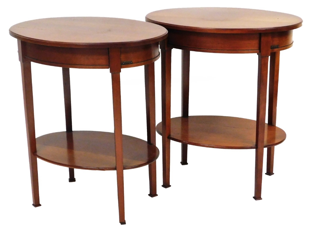 A pair of Grange Furniture oval occasional tables, each on square tapering legs joined by an oval un