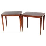 A pair of Empire style 20thC mahogany finished side tables, each with canted rectangular tops on ree
