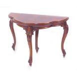 A Victorian figured walnut quatrefoil card table, with folding top having green baize lining, plain