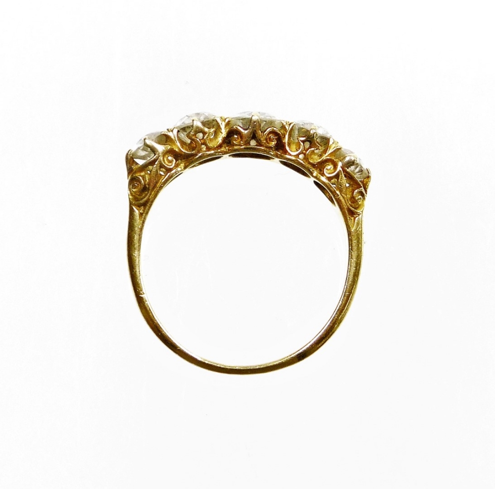 A Victorian diamond five stone dress ring, set with five round brilliant cut diamonds, the central s - Image 3 of 4