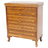 A heavily carved Eastern teak chest of drawers, the top set with an outline of rosettes and flow