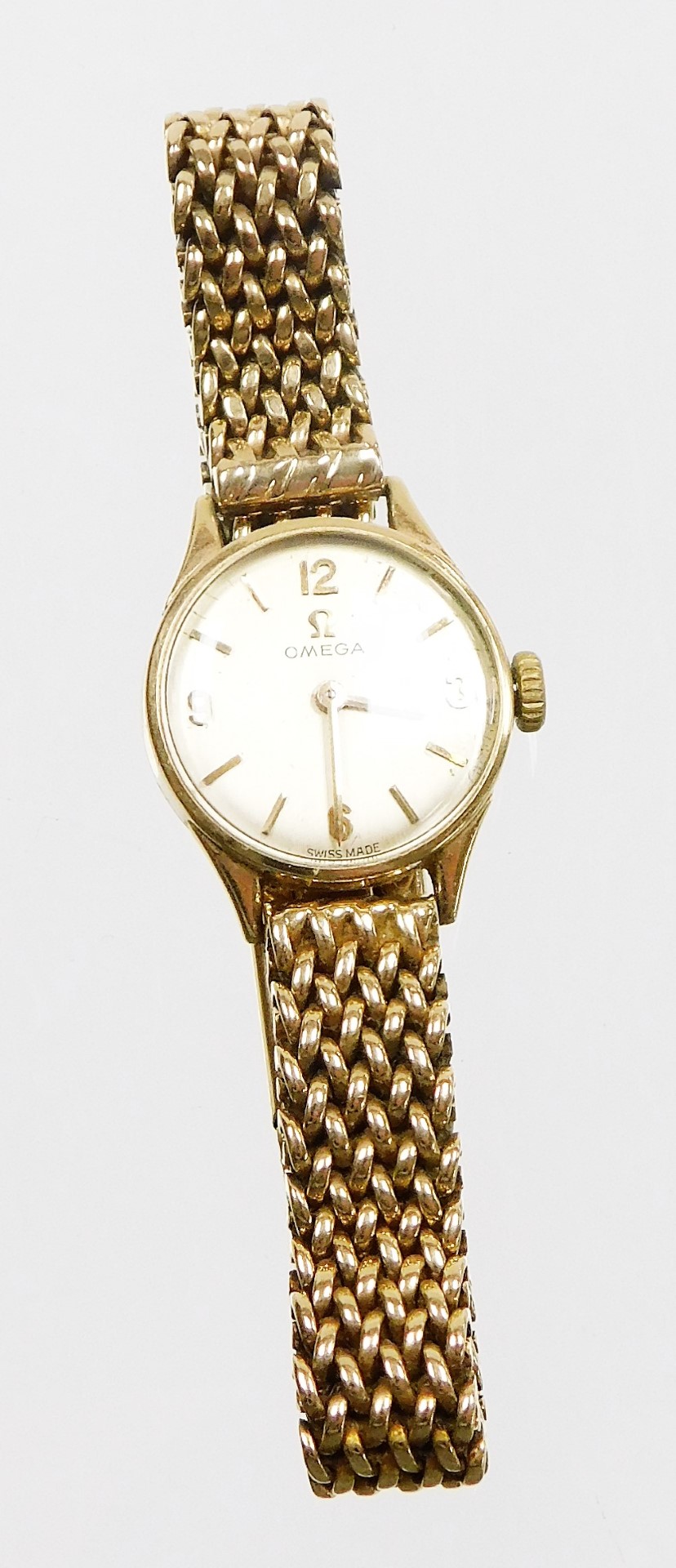 An Omega 9ct gold ladies wristwatch, with small circular silvered dial, 1.2cm diameter, on a four ro - Image 2 of 3