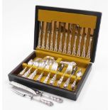 A canteen of Community Plate cutlery for six place settings, with elaborate rococo scroll handles.