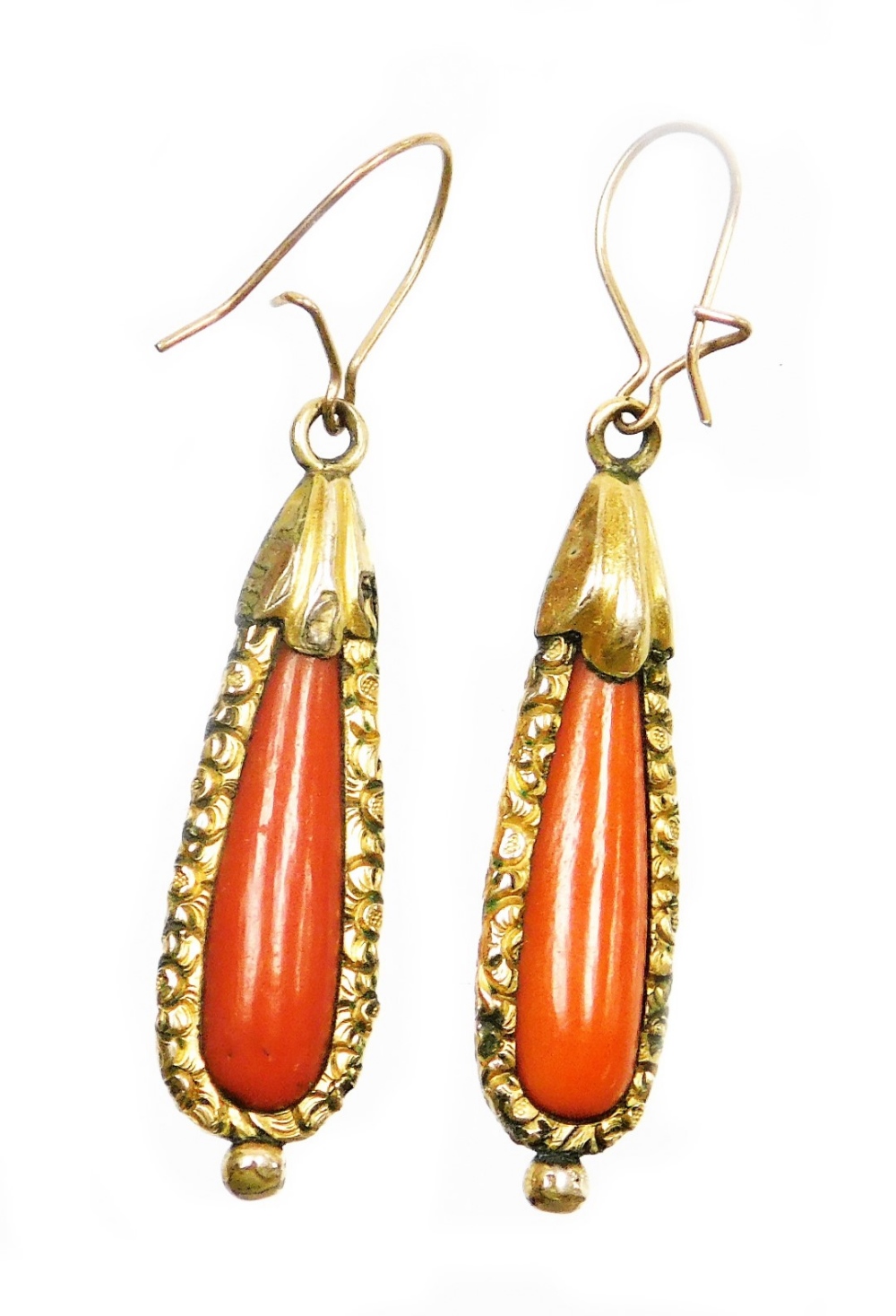 A pair of early to mid 20thC coral drop earrings, each with tear drop shaped coral centre and a gold