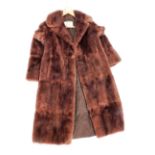 A National Fur Company Ltd brown fur coat, with brown lining.