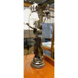 A resin figural lamp, depicting a lady in flowing dress, with leaf branched shade (AF lacking arm, f