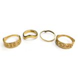 Four 9ct gold dress rings, to include a thick wishbone ring, ring size J½, a thin wishbone ring, rin