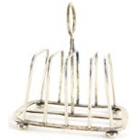 A late Victorian silver four division toast rack, on ball feet, (AF), London 1897, 4½oz.