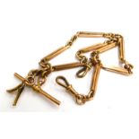 A 9ct gold watch chain, converted from two chains with a central t-bar clip and two clips, and old c