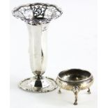 A George IV pierced silver vase, of tapering form on a domed foot, Sheffield 1920 and a cauldron sha