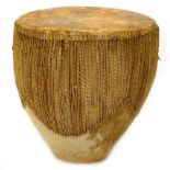 An African hide Tribal drum, 59cm wide, 54cm diameter.