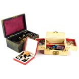 Two jewellery boxes and contents of costume jewellery, comprising clip on earrings, brooches, screw