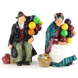 Two Royal Doulton porcelain figurines, the Old Balloon Seller and The Balloon Man.