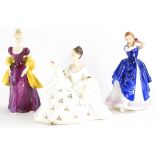 A collection of three Royal Doulton figurines, Laura, Loretta and My Love.