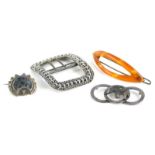 A small group of jewellery, comprising a silver elephant brooch, a silver and blue stone set brooch,