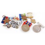 A collection of WWII medals, to include the Atlantic Star with ribbon, the 1939-45 Star, the War Med