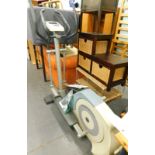 A Tunturi Elliptical trainer, with power lead, instruction manuals, etc.