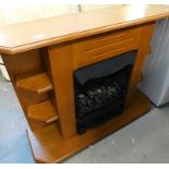 An electric fire, in simulated oak surround.