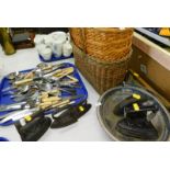 A quantity of flatware, baskets, flower baskets, cast irons, silver plated basket, etc. (a quantity)