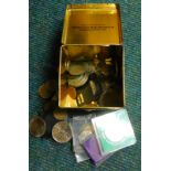 A quantity of commemorative crowns and various other coins, etc., in a metal tin.