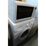 A Panasonic NN-CT55W microwave and a Daewoo 6kg washing machine.