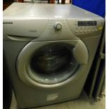 A Hoover OPH714DS 7kg washing machine.