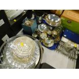 Plated wares, to include a two handled wine bottle holder, toast rack, goblets, part cruet, plated t