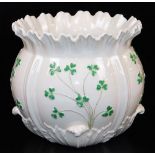 A second period Belleek shamrock moulded jardiniere, the moulded detail picked out in green, black m